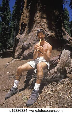 Picture - A free-spirited flute player. Fotosearch