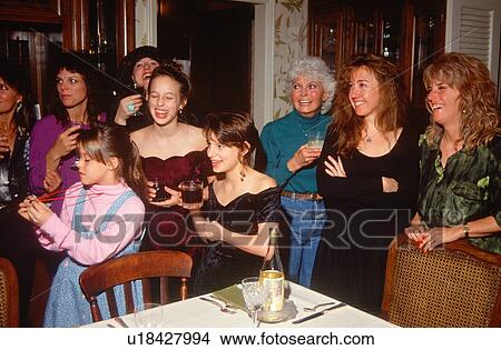 A group women enjoying a Christmas toast View Large Photo Image Picture - A group women enjoying a Christmas toast. Fotosearch