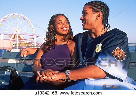 Stock Photo - A young African-American couple in love. Fotosearch