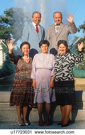 Stock Image - Albanian immigrant family celebrating American citizenship, Logan Square Fountain. Fotosearch