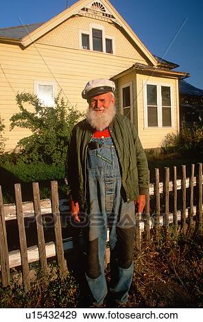 An old sailor in overalls View Large Photo Image Stock Photo - An old sailor in overalls. Fotosearch