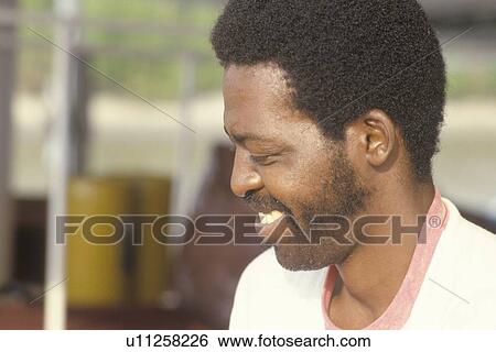Stock Photograph - Close-up of an African-American man. Fotosearch
