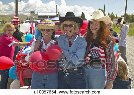 Picture - Three women dressed for the Fourth of July. Fotosearch