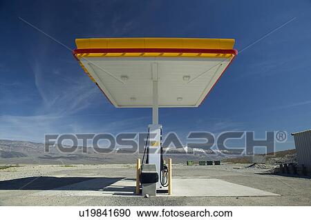 A desolate Gas Station with a sign reading Self View Large Photo Image Stock Image - A desolate Gas Station with a sign reading Self. Fotosearch