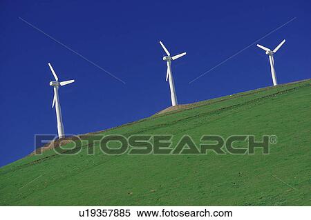Stock Photography - Wind turbines on a hill. Fotosearch
