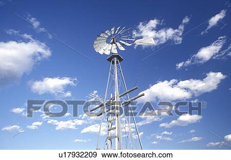 Windmill in Big Sky Country View Large Photo Image Stock Photo - Windmill in Big Sky Country. Fotosearch