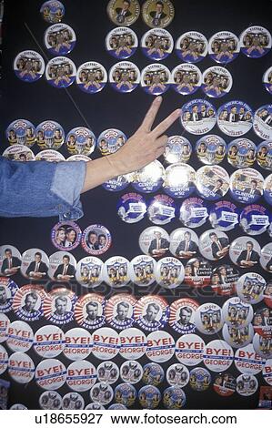 A hand making a V symbol in front of Clinton/Gore political campaign buttons View Large Photo Image Stock Photo - A hand making a V symbol in front of Clinton/Gore political campaign buttons. Fotosearch