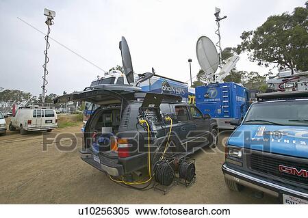 Media vans set up in dirt parking lot, CSU- Dominguez Hills View Large Photo Image Stock Photography - Media vans set up in dirt parking lot, CSU- Dominguez Hills. Fotosearch