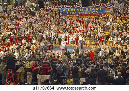 Picture - Senator addresses audience of supporters at a southern Ohio high school gymnasium in 2004. Fotosearch