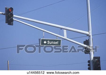 Stock Image - A sign that reads “Sunset”. Fotosearch