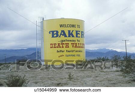 Stock Photo - A sign that reads Welcome to Baker…gateway to Death Valley”. Fotosearch