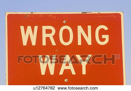 A sign that reads “Wrong Way” View Large Photo Image Stock Image - A sign that reads “Wrong Way”. Fotosearch