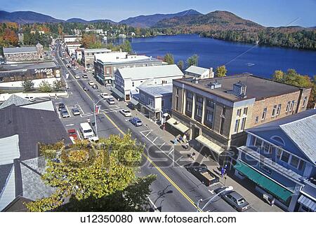 Stock Image - Aerial view of Lake Placid, NY downtown with Adirondack Mountains. Fotosearch