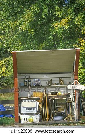 Closed roadside refreshment stand with tools and goods displayed View Large Photo Image Stock Image - Closed roadside refreshment stand with tools and goods displayed. Fotosearch