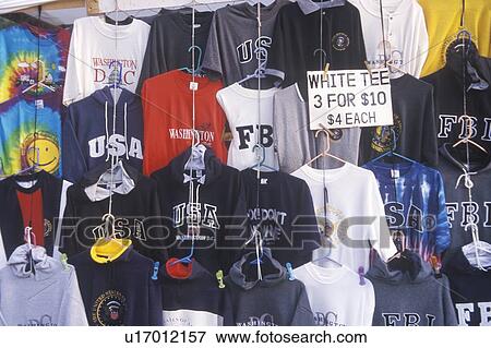 Display of T-shirts at roadside attraction View Large Photo Image Stock Photo - Display of T-shirts at roadside attraction. Fotosearch