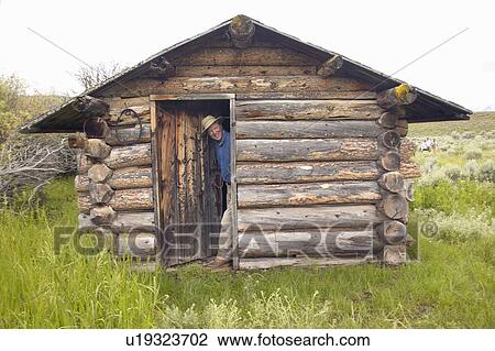 Stock Image - John Taft at deserted old homestead in summer in Centennial Valley near Lakeview. Fotosearch