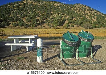 Picnic table with garbage cans at roadside rest area View Large Photo Image Stock Image - Picnic table with garbage cans at roadside rest area. Fotosearch