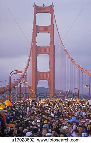 Stock Image - 800, 000 people cross the Golden Gate Bridge on the bridges 50th Anniversary, San Francisco. Fotosearch