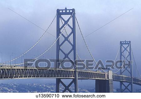 Fog enshrouded San Francisco and Bay Bridge View Large Photo Image Stock Image - Fog enshrouded San Francisco and Bay Bridge. Fotosearch
