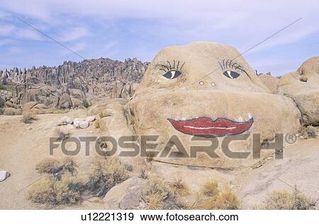 Red lips and woman's face painted on rock in Alabama Hills View Large Photo Image Stock Photo - Red lips and woman's face painted on rock in Alabama Hills. Fotosearch