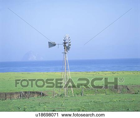Wooden windmill in a field, Morro Bay View Large Photo Image Stock Image - Wooden windmill in a field, Morro Bay. Fotosearch
