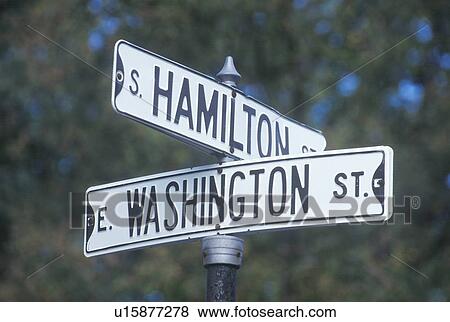 Stock Photo - A sign that reads “Washington/Hamilton”. Fotosearch