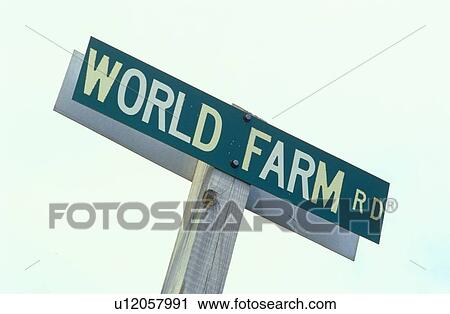 Stock Image - A sign that reads “World Farm Rd”. Fotosearch