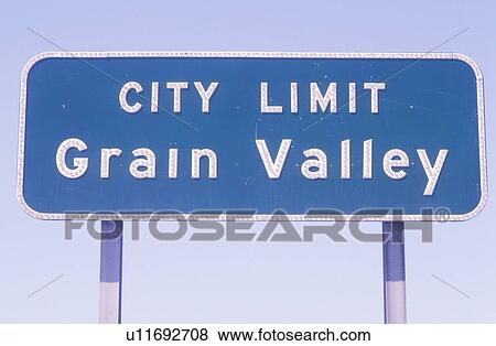 Stock Photo - A sign that reads “city limit grain valley”. Fotosearch