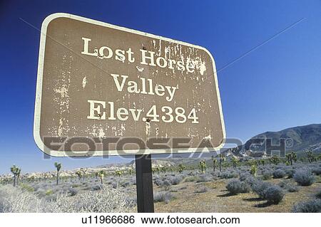 Stock Photograph - A sign that reads “Lost horse valley”. Fotosearch