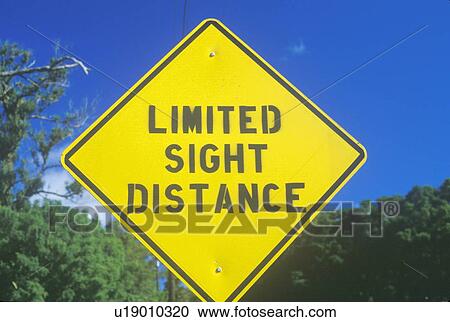 Stock Image - A sign that reads “Limited Sight Distance”. Fotosearch