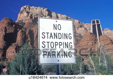Picture - A sign that reads “No standing stopping parking”. Fotosearch