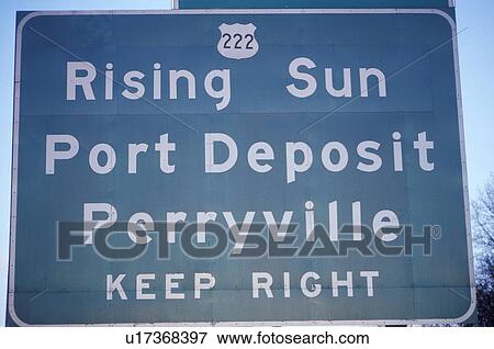 A sign that reads “Rising Sun Port Dempsey Perryville Keep Right” View Large Photo Image Stock Photo - A sign that reads “Rising Sun Port Dempsey Perryville Keep Right”. Fotosearch