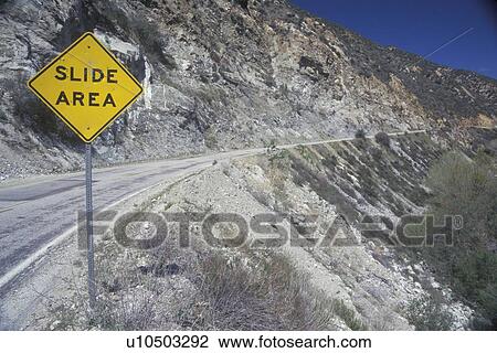 Stock Image - A sign that reads “Slide area”. Fotosearch