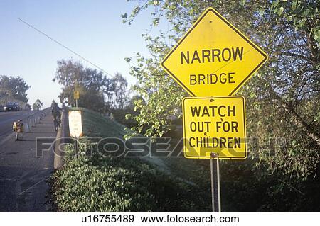 Stock Photo - A sign that reads “Watch out for children”. Fotosearch