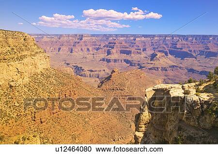 Stock Image - Edge of South Rim of Grand Canyon National Park. Fotosearch