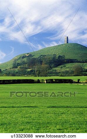 Stock Photo - Glastonbury Tor, A sacred site along the English countryside. Fotosearch