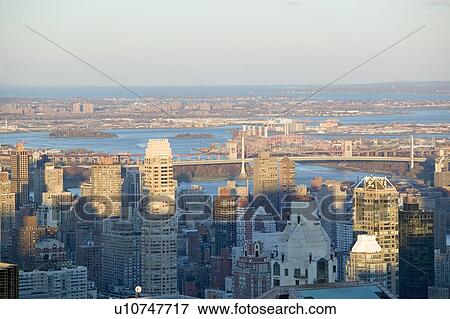 Stock Photo - Panoramic views of New York City at sunset. Fotosearch
