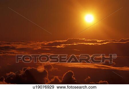 Stock Photo - Sunrise With Clouds. Fotosearch