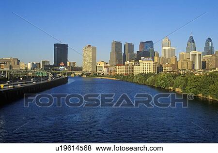 Stock Photo - Sunset over Philadelphia skyline from the Schuylkill River. Fotosearch