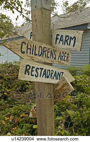 Old antique road signs to Children's Area in Andersonville View Large Photo Image Picture - Old antique road signs to Children's Area in Andersonville. Fotosearch