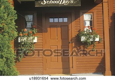 Picture - Red schoolhouse entry. Fotosearch