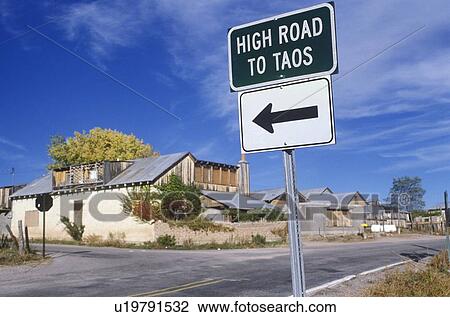Stock Image - Road sign on High Road to Taos. Fotosearch