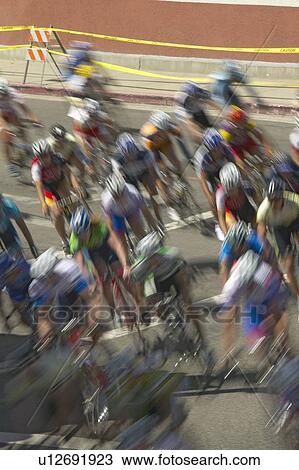 Stock Image - Amateur Men Bicyclists. Fotosearch
