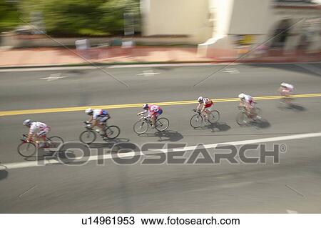 Stock Image - Amateur Men Bicyclists. Fotosearch