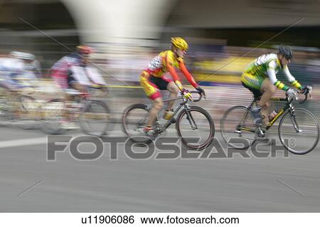 Stock Photograph - Amateur Men Bicyclists. Fotosearch