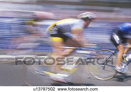 Bicyclist crossing finish line View Large Photo Image Stock Image - Bicyclist crossing finish line. Fotosearch