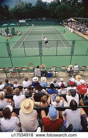 Crowd watching tennis tournament View Large Photo Image Stock Photo - Crowd watching tennis tournament. Fotosearch