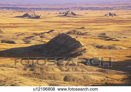 Stock Photo - Badlands National Park at sunset. Fotosearch