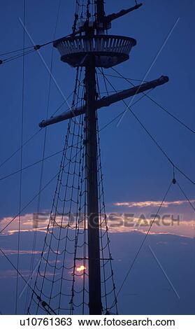 Mast of a schooner at dusk View Large Photo Image Stock Image - Mast of a schooner at dusk. Fotosearch