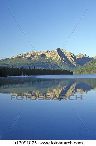 Stock Photography - Redfish Lake and Sawtooth Mountains at Sunrise. Fotosearch